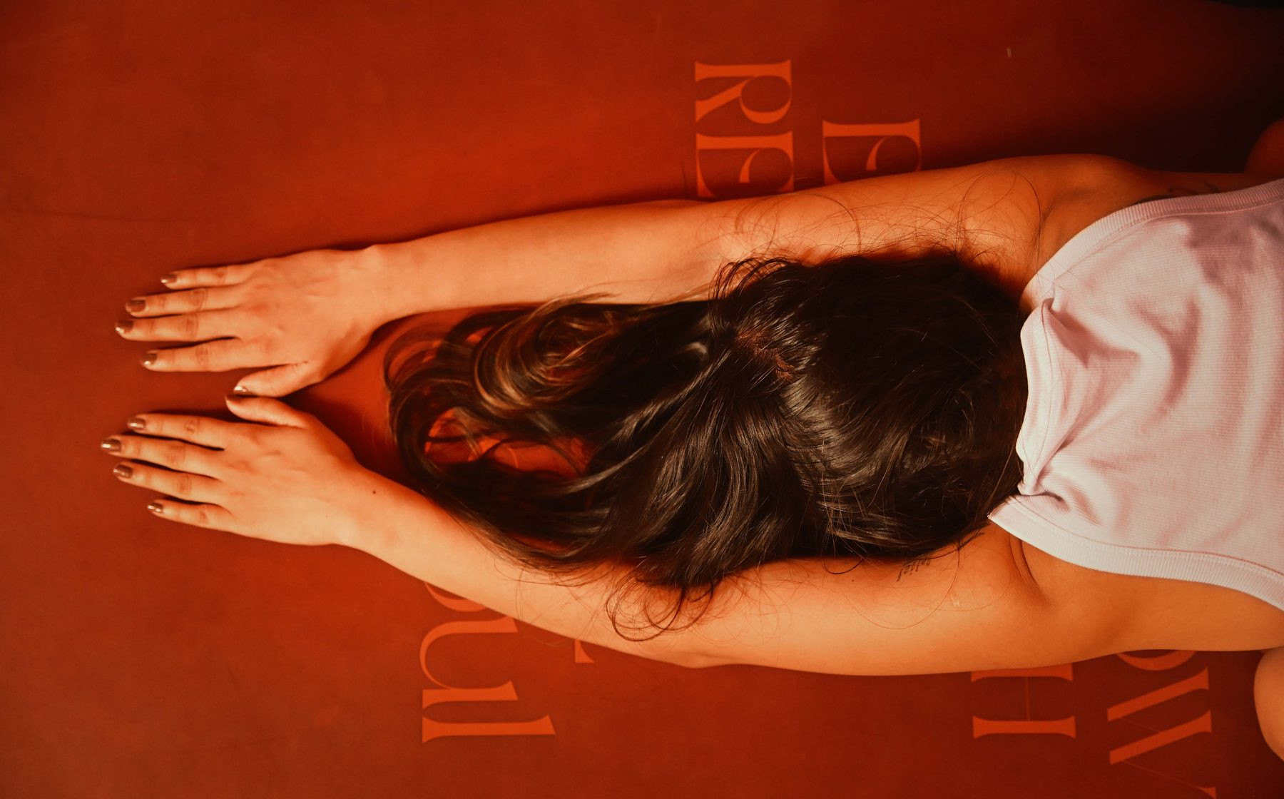 Yin yoga resting posture on a mat at AndSoul Sanctuary, Shoreditch